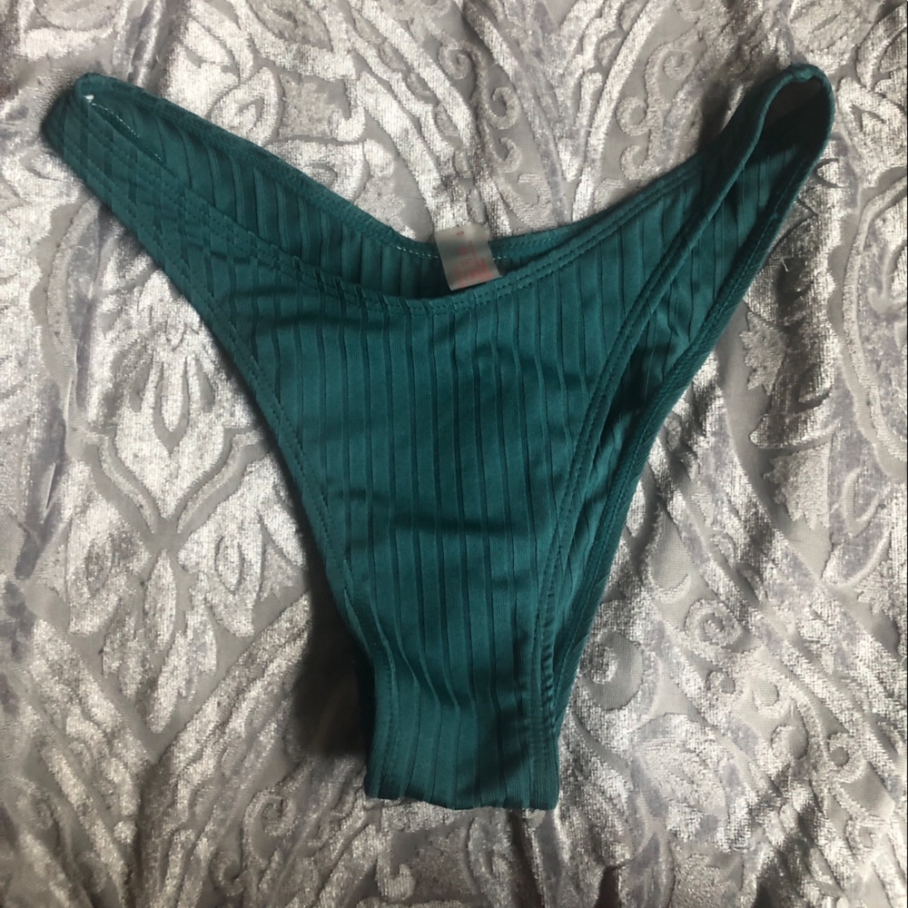 Never worn dark blue bikini bottoms